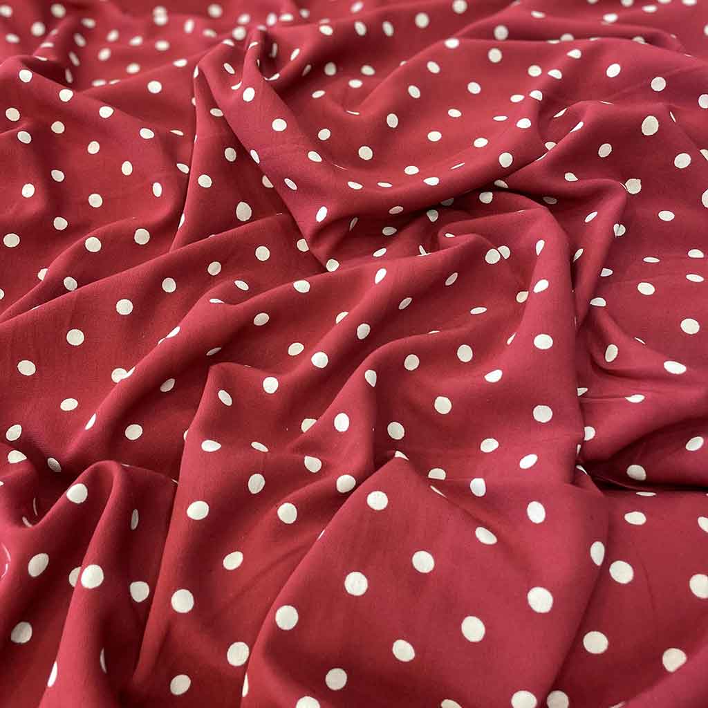 پارچه نخی قرمز خال خال