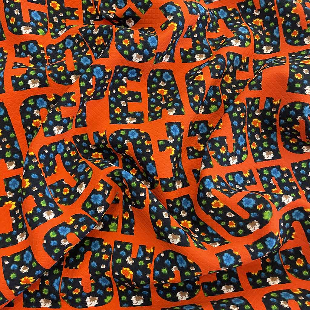 پارچه نخی طرحدار الفبا نارنجی