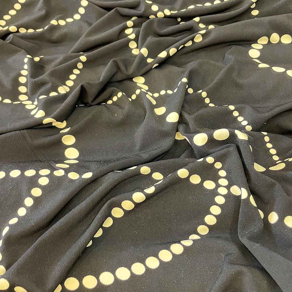 پارچه نخی طرحدار مشکی توپ توپی