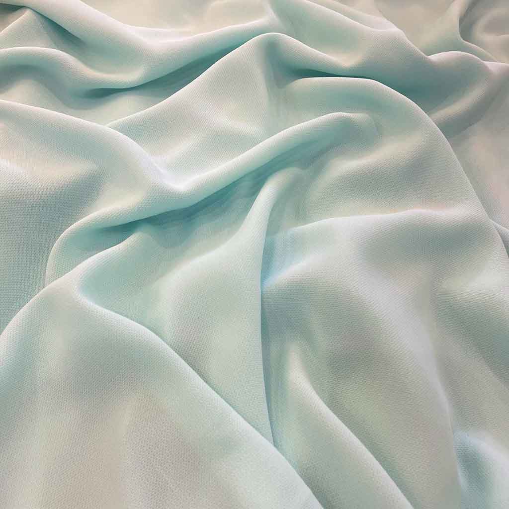پارچه شانتون سبز آبی ساده