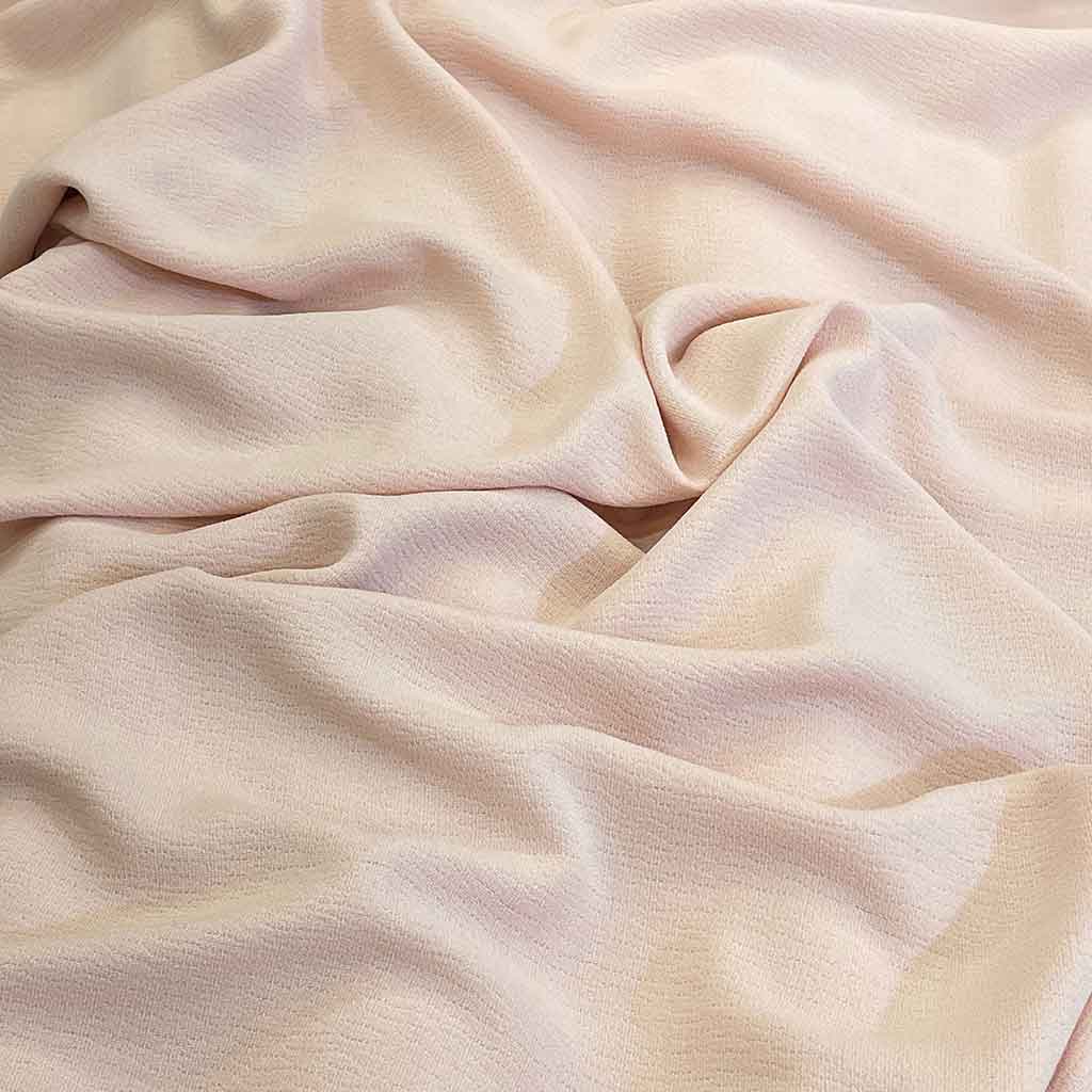 پارچه کریشه پفکی ساده رنگ صورتی کثیف