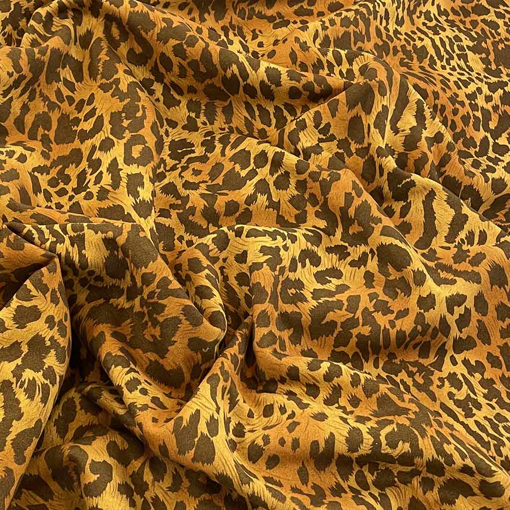 پارچه مخمل طرحدار پلنگی طلایی